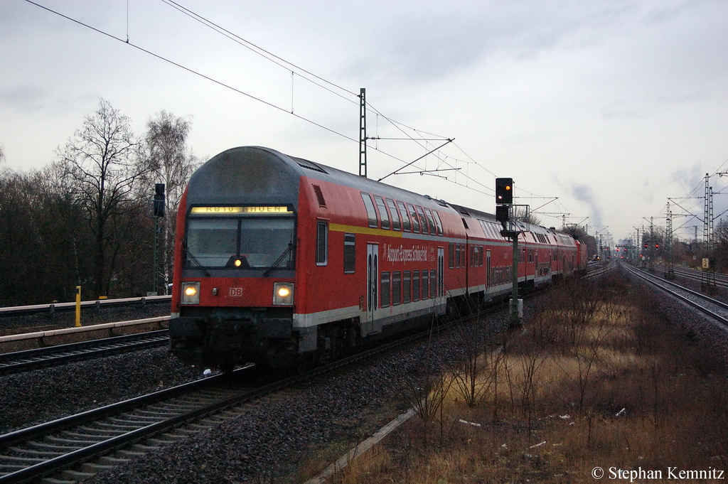 RB10 (RB 18968) von Berlin Hbf (tief) nach Nauen in Berlin Jungfernheide. Geschoben hatte die 143 233-5. 13.12.2011
