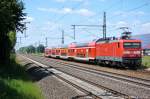 BR 114/142975/die-114-005-verlsst-gerade-mit Die 114 005 verlsst gerade mit ihrem RE4 (RE 37312) nach Wismar den Bahnhof Friesack(Mark). 03.06.2011