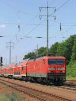 BR 114/198971/114-029-mit-dem-re 114 029   mit dem RE 3 (RE 18xxx) nach Elsterwerder  am 23. Mai 2012 bei km 24.0 auf dem sdlichen Berliner Auenring bei Diedersdorf.

