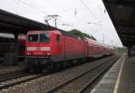 BR 143/148660/143-205-3-schob-am-04072011-einen 143 205-3 schob am 04.07.2011 einen RE von Dresden Hbf nach Hoyerswerda. Hier steht der Zug in Ruhland.