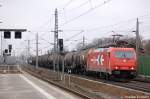 BR 185/127483/185-631-9-hgk-2066-mit-kesselzug 185 631-9 (HGK 2066) mit Kesselzug in Rathenow in Richtung Wustermark unterwegs. 18.03.2011