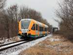 VT 646.040 der Ostdeutsche Eisenbahn GmbH am 21. Februar 2012 als OE 51 (OE 68976)  in Richtung Rathenow am Bahnbergang in der Cassmannstrasse  in Brandenburg.      
