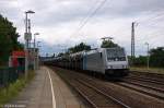 185 677-2 Railpool GmbH für PCT - Private Car Train GmbH mit einem VW Autotransportzug in Saarmund und fuhr in Richtung Genshagener Heide weiter. 05.06.2012 