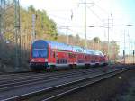 RE 3 (RE 18350) nach Schwedt(Oder) mit der Schublok 112 124 am 30. Dezember 2012 auf dem Berliner Außenring bei Diedersdorf.