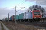 482 041-1 SBB Cargo die für TX Logistik fährt mit Containerzug zwischen Großwudicke und Rathenow in Richtung Stendal unterwegs. 24.03.2011