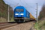 253 014-9 PRESS (223 051-4) mit einem Holzzug bei Nennhausen und fuhr in Richtung Rathenow weiter.